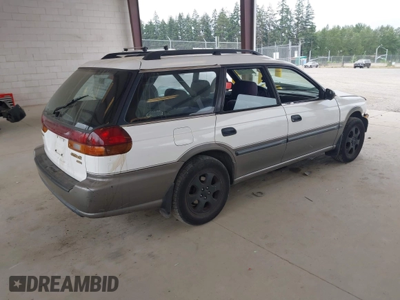 1998 Subaru Legacy Outback with VIN 4S3BG6850W6651335, listed as a IAAI auction lot 42482870 with 217,720 mi miles and . Bid and sale history available at DreamBid. Image 4.