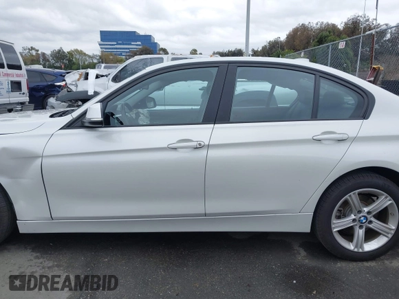 2015 BMW 3 Series 320i with VIN WBA3B1C5XFK137171, listed as a IAAI auction lot 41736278 with 28,673 mi miles. Bid and sale history available at carsss.com. Image 14.
