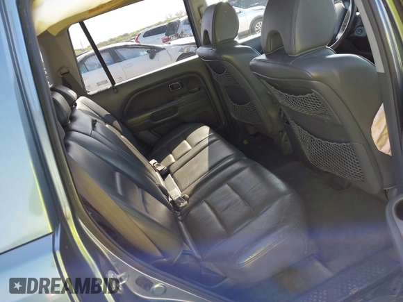 2006 Honda Pilot EX-L with VIN 2HKYF18506H521822, listed as a IAAI auction lot 42012612 with 187,946 mi miles and . Bid and sale history available at DreamBid. Image 8.