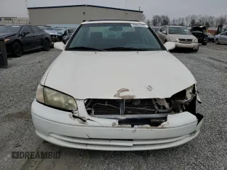 2001 Toyota Camry CE z VIN JT2BG22K210600687, wystawiony jako Copart lot #48807225 z przebiegiem 307 479 mil mil oraz Szkoda całkowita • Salvage title. Historia ofert i sprzedaży dostępna na DreamBid. Obrazek 5.