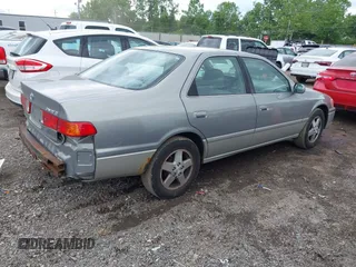 2001 Toyota Camry CE z VIN JT2BG22K410587070, wystawiony jako IAAI lot #42388043 z przebiegiem 119 183 mil mil oraz . Historia ofert i sprzedaży dostępna na DreamBid. Obrazek 4.