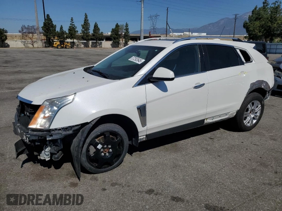 2015 Cadillac SRX Luxury Collection z VIN 3GYFNBE31FS634519, wystawiony jako Copart lot #57292645 z przebiegiem 93 777 mil mil oraz Szkody całkowita. Historia ofert i sprzedaży dostępna na DreamBid. Obrazek 1.