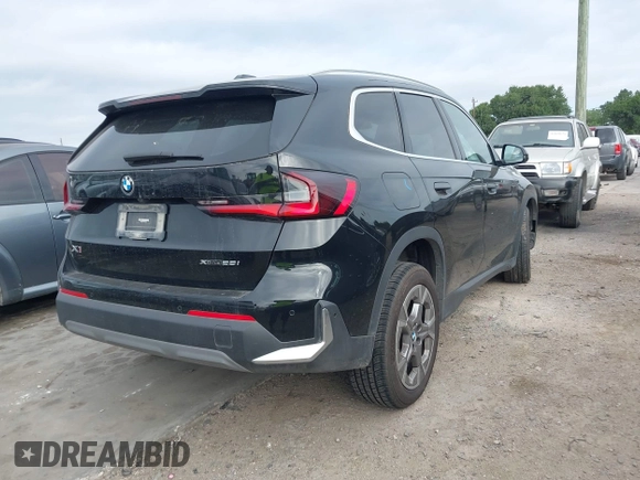 2023 BMW X1 xDrive28i with VIN WBX73EF04P5W37659, listed as a IAAI auction lot 42167511 with 36,820 mi miles and . Bid and sale history available at DreamBid. Image 4.