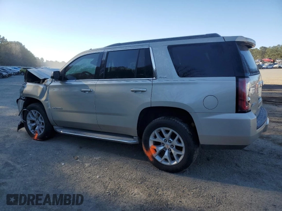2015 GMC Yukon SLE with VIN 1GKS1AKC4FR265208, listed as a Copart auction lot 42324245 with 105,760 mi miles and Salvage Title. Bid and sale history available at carsss.com. Image 2.
