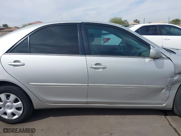 2004 Toyota Camry LE with VIN 4T1BE32K54U323478, listed as a IAAI auction lot 41725144 with 135,613 mi miles. Bid and sale history available at carsss.com. Image 13.