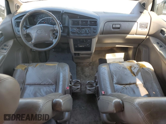 1998 Toyota Sienna LE z VIN 4T3ZF13C4WU006180, wystawiony jako Copart lot #50349795 z przebiegiem 237 600 mil mil oraz Szkoda całkowita • Salvage title. Historia ofert i sprzedaży dostępna na DreamBid. Obrazek 8.