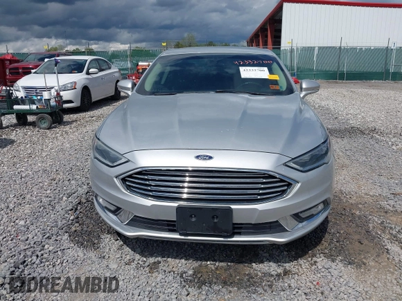 2017 Ford Fusion Titanium with VIN 3FA6P0K99HR112234, listed as a IAAI auction lot 42332700 with 106,685 mi miles and . Bid and sale history available at DreamBid. Image 12.