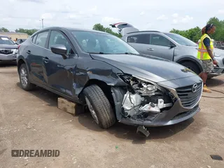 2014 Mazda 3 i Touring with VIN JM1BM1V74E1161493, listed as a IAAI auction lot 42556989 with 102,101 mi miles and . Bid and sale history available at DreamBid. Image 1.
