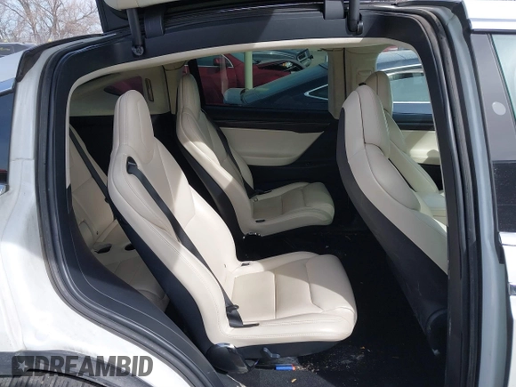 2018 Tesla Model X 75D with VIN 5YJXCBE27JF121834, listed as a IAAI auction lot 41769246 with 90,814 mi miles and . Bid and sale history available at carsss.com. Image 8.
