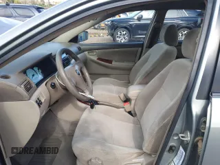 2004 Toyota Corolla CE with VIN 1NXBR38E44Z310906, listed as a Copart auction lot 55361565 with 186,022 mi miles and Salvage Title. Bid and sale history available at DreamBid. Image 7.