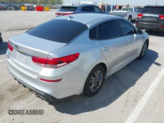 2019 Kia Optima LX with VIN 5XXGT4L39KG323046, listed as a IAAI auction lot 42035766 with 164,643 mi miles and . Bid and sale history available at DreamBid. Image 4.
