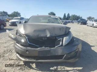 2013 Kia Optima EX z VIN 5XXGN4A77DG199443, wystawiony jako Copart lot #62406035 z przebiegiem 171 081 mil mil oraz Szkoda całkowita • Salvage title. Historia ofert i sprzedaży dostępna na DreamBid. Obrazek 5.
