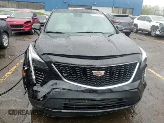 2022 Cadillac XT4 AWD Sport с VIN 1GYFZFR46NF170841, выставлен на аукционе Copart как лот 55863705 с пробегом 14 745 миль миль и Списание • Salvage title. История ставок и продаж доступна на DreamBid. Изображение 14.