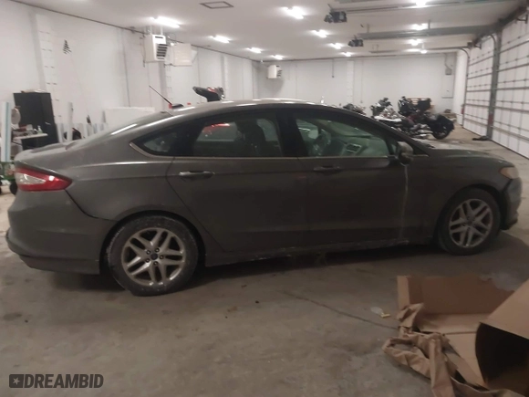 2014 Ford Fusion SE with VIN 1FA6P0H73E5389384, listed as a IAAI auction lot 41387809 with 164,490 mi miles. Bid and sale history available at carsss.com. Image 13.