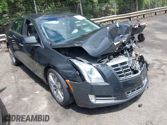 2013 Cadillac XTS Luxury z VIN 2G61P5S34D9109189, wystawiony jako IAAI lot #42242533 z przebiegiem 178 234 mil mil oraz . Historia ofert i sprzedaży dostępna na DreamBid. Obrazek 1.