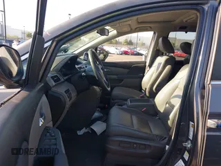 2015 Honda Odyssey EX-L with VIN 5FNRL5H61FB126933, listed as a IAAI auction lot 42003978 with 69,025 mi miles and . Bid and sale history available at carsss.com. Image 5.