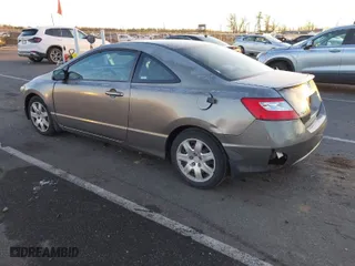 2007 Honda Civic Cpe LX with VIN 2HGFG12667H558133, listed as a IAAI auction lot 41203439 with 220,144 mi miles. Bid and sale history available at carsss.com. Image 3.