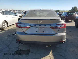 2025 Toyota Camry LE z VIN 4T1DAACK6SU548190, wystawiony jako Copart lot #88311855 z przebiegiem 8 209 mil mil oraz Szkoda całkowita • Salvage title. Historia ofert i sprzedaży dostępna na DreamBid. Obrazek 6.