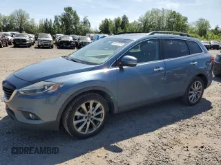 2014 Mazda CX-9 Grand Touring with VIN JM3TB3DV1E0427197, listed as a Copart auction lot 60572315 with 144,778 mi miles and Salvage title. Bid and sale history available at DreamBid. Image 1.