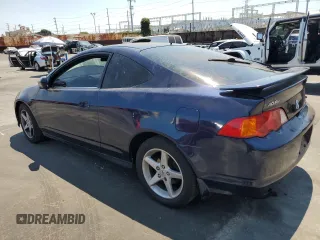 2002 Acura RSX Auto with VIN JH4DC548X2C030807, listed as a Copart auction lot 65178665 with 138,260 mi miles and Salvage title. Bid and sale history available at DreamBid. Image 2.