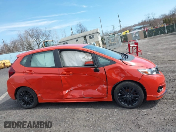 2018 Honda Fit Sport with VIN 3HGGK5G69JM725094, listed as a IAAI auction lot 41833358 with 80,293 mi miles and . Bid and sale history available at DreamBid. Image 13.