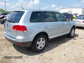 2007 Volkswagen Touareg V6 z VIN WVGZE77L57D000964, wystawiony jako IAAI lot #42159667 z przebiegiem 143 542 mil mil oraz . Historia ofert i sprzedaży dostępna na DreamBid. Obrazek 4.