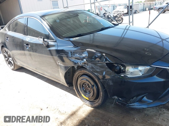 2015 Mazda 6 i Grand Touring with VIN JM1GJ1W59F1179548, listed as a IAAI auction lot 42004860 with 153,532 mi miles and . Bid and sale history available at DreamBid. Image 6.