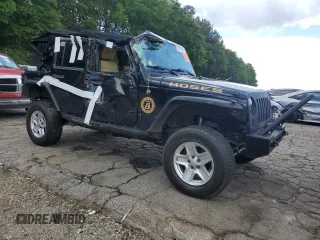 2012 Jeep Wrangler Unlimited Sport z VIN 1C4BJWDG7CL208265, wystawiony jako Copart lot #56101095 z przebiegiem 141 527 mil mil oraz Szkoda całkowita • Salvage title. Historia ofert i sprzedaży dostępna na DreamBid. Obrazek 4.