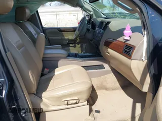 2014 Nissan Armada SV z VIN 5N1AA0NC3EN607990, wystawiony jako IAAI lot #41775889 z przebiegiem 146 422 mil mil oraz . Historia ofert i sprzedaży dostępna na DreamBid. Obrazek 5.