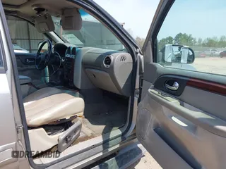 2002 GMC Envoy SLT with VIN 1GKDS13S422446808, listed as a IAAI auction lot 41896943 with 271,771 mi miles. Bid and sale history available at carsss.com. Image 5.