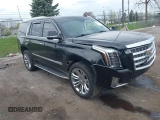 2019 Cadillac Escalade Luxury with VIN 1GYS4BKJ5KR226509, listed as a IAAI auction lot 42109379 with 84,009 mi miles and . Bid and sale history available at DreamBid. Image 1.