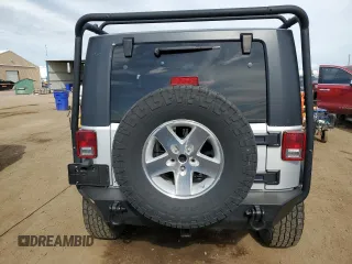2009 Jeep Wrangler X with VIN 1J4FA24199L787574, listed as a Copart auction lot 58189835 with 74,331 mi miles and Salvage title. Bid and sale history available at DreamBid. Image 6.