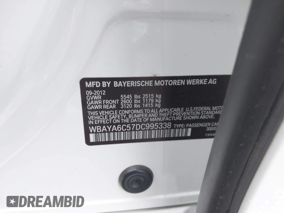 2013 BMW 7 Series 740i with VIN WBAYA6C57DC995338, listed as a IAAI auction lot 41479077 with 123,680 mi miles and . Bid and sale history available at DreamBid. Image 9.