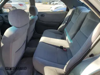 1999 Mazda 626 ES with VIN 1YVGF22C4X5887335, listed as a Copart auction lot 51726654 with 147,359 mi miles and Salvage Title. Bid and sale history available at carsss.com. Image 10.