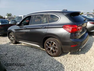 2021 BMW X1 xDrive28i with VIN WBXJG9C09M5T96327, listed as a Copart auction lot 49876493 with 42,572 mi miles. Bid and sale history available at carsss.com. Image 2.