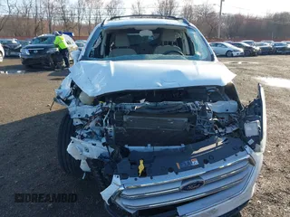 2017 Ford Escape SE with VIN 1FMCU9GD5HUE00425, listed as a IAAI auction lot 41843115 with 64,896 mi miles. Bid and sale history available at carsss.com. Image 17.