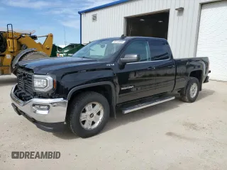 2018 GMC Sierra 1500 SLE z VIN 1GTV2MEC9JZ214640, wystawiony jako Copart lot #58149045 z przebiegiem 134 865 mil mil oraz Czysty tytuł • Clean title. Historia ofert i sprzedaży dostępna na DreamBid. Obrazek 1.