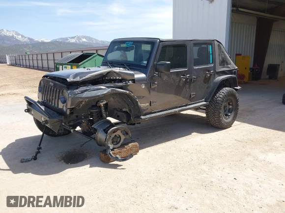 2014 Jeep Wrangler Unlimited Rubicon с VIN 1C4BJWFG2EL279938, выставлен на аукционе IAAI как лот 41920729 с пробегом 76 418 миль миль и . История ставок и продаж доступна на DreamBid. Изображение 18.