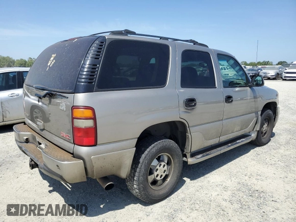 2003 GMC Yukon Denali z VIN 1GKEK63U13J255146, wystawiony jako Copart lot #53694665 z przebiegiem 256 523 mil mil oraz Szkody całkowita. Historia ofert i sprzedaży dostępna na DreamBid. Obrazek 3.