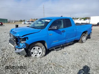2021 Toyota Tundra SR with VIN 5TFUY5F18MX983255, listed as a Copart auction lot 87044834 with 33,821 mi miles and Salvage title. Bid and sale history available at DreamBid. Image 1.