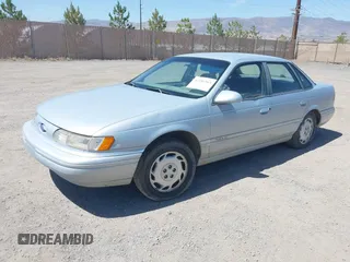 1994 Ford Taurus GL z VIN 1FALP52U2RG186625, wystawiony jako IAAI lot #42381964 z przebiegiem 54 020 mil mil oraz . Historia ofert i sprzedaży dostępna na DreamBid. Obrazek 2.