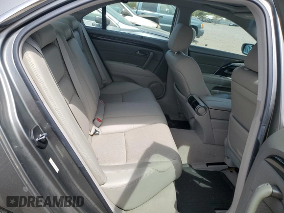 2009 Acura RL Tech Pkg with VIN JH4KB266X9C000169, listed as a Copart auction lot 54623365 with 102,035 mi miles and Salvage Title. Bid and sale history available at carsss.com. Image 10.
