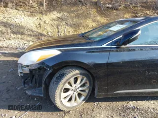 2014 Hyundai Azera with VIN KMHFG4JG7EA362185, listed as a IAAI auction lot 41877622 with 158,689 mi miles and . Bid and sale history available at DreamBid. Image 14.