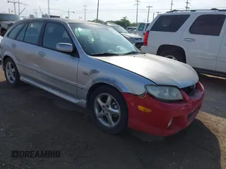 2003 Mazda Protege with VIN JM1BJ245031218333, listed as a IAAI auction lot 42070471 with 181,748 mi miles and . Bid and sale history available at DreamBid. Image 1.
