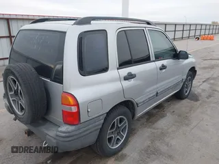 2003 Chevrolet Tracker z VIN 2CNBE134736919970, wystawiony jako IAAI lot #42203446 z przebiegiem 158 872 mil mil oraz . Historia ofert i sprzedaży dostępna na DreamBid. Obrazek 4.