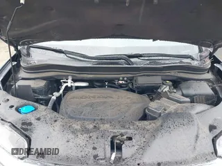 2021 Honda Pilot Touring 8-Passenger with VIN 5FNYF5H9XMB014190, listed as a IAAI auction lot 41749586 with 67,602 mi miles and . Bid and sale history available at DreamBid. Image 10.