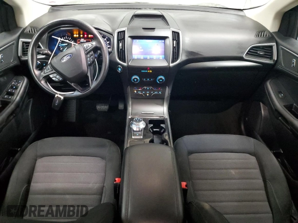 2020 Ford Edge SE z VIN 2FMPK4G9XLBA07766, wystawiony jako Copart lot #56852365 z przebiegiem 151 664 mil mil oraz Szkoda całkowita • Salvage title. Historia ofert i sprzedaży dostępna na DreamBid. Obrazek 8.