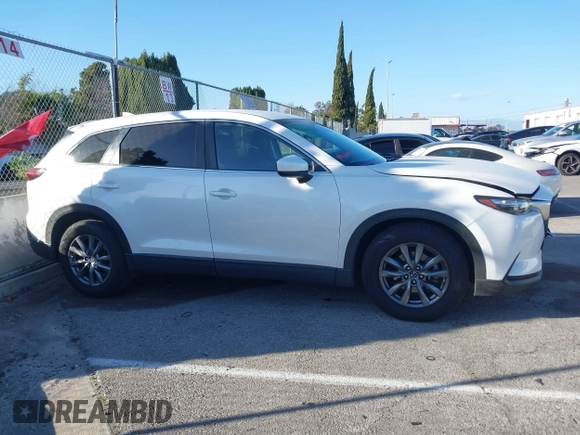 2019 Mazda CX-9 Sport с VIN JM3TCABY9K0309019, выставлен на аукционе IAAI как лот 41703012 с пробегом 64 390 миль миль и . История ставок и продаж доступна на DreamBid. Изображение 13.