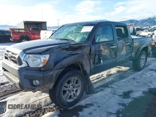 2013 Toyota Tacoma with VIN 3TMMU4FNXDM059768, listed as a IAAI auction lot 41375737 with 227,477 mi miles. Bid and sale history available at carsss.com. Image 2.