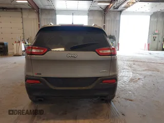 2014 Jeep Cherokee Latitude with VIN 1C4PJLCS1EW106004, listed as a IAAI auction lot 41786457 with 145,588 mi miles. Bid and sale history available at carsss.com. Image 16.